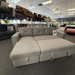 Sectional With Pop-up Bed And Storage