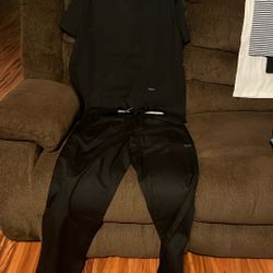 8 Pair Of Black Scrubs And Black Large Lab Coat 