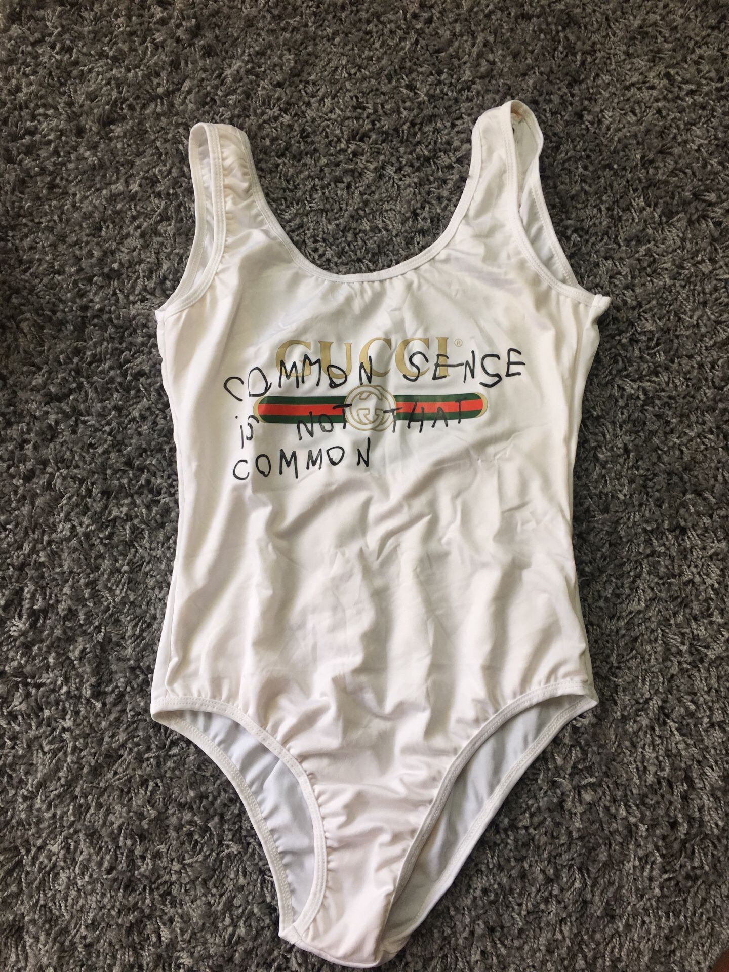 GUCCI BODYSUIT SIZE LARGE