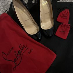 Christian Louboutins  Red Bottoms 