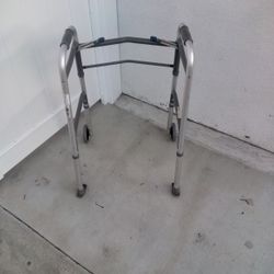 Walker - Foldable. Can Hold Up To 300 LBS