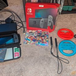 Nintendo Switch With 2 Games, 2 Steering Wheels And Carrying Case
