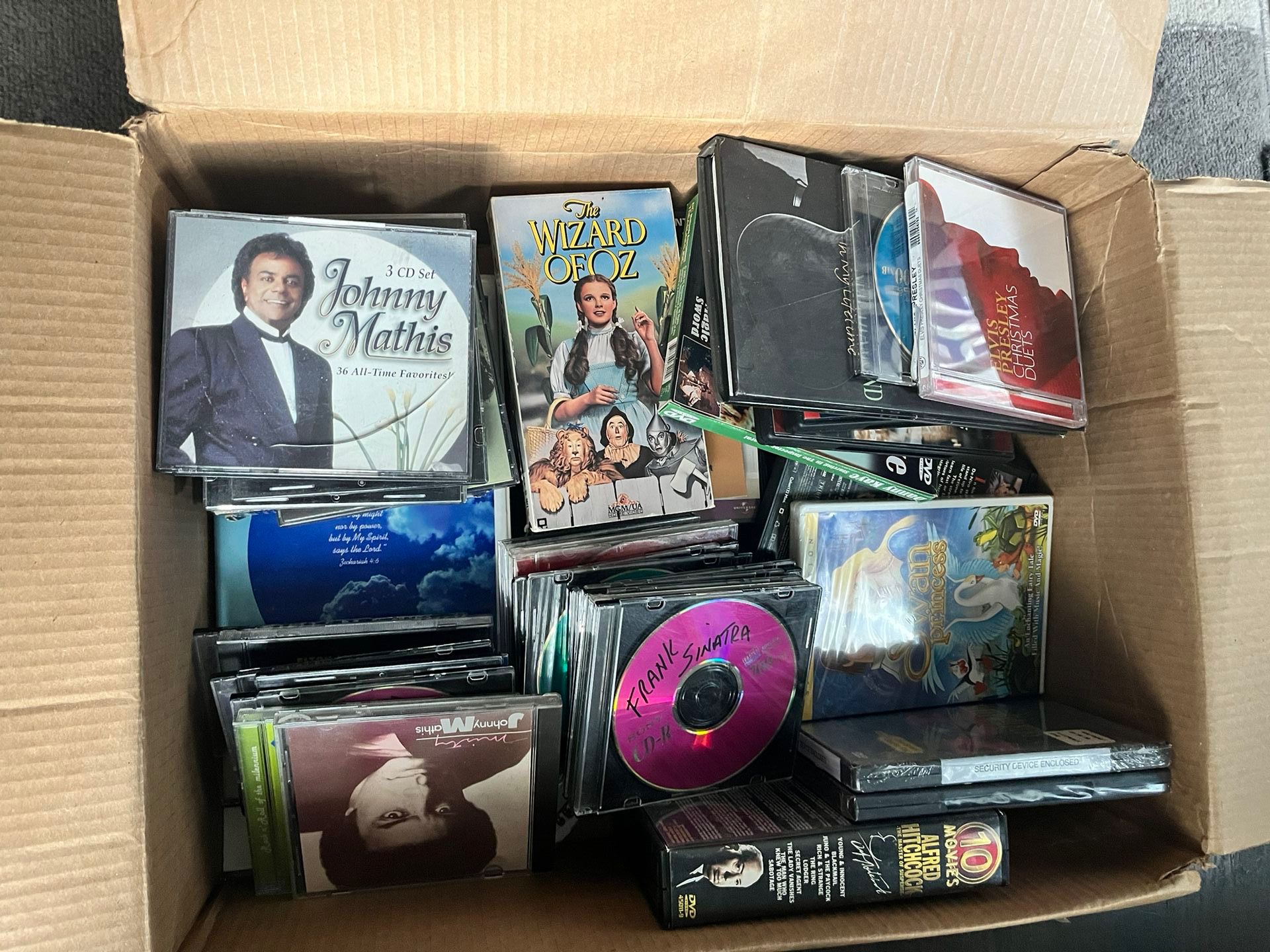 Box Of DVDs And CDS
