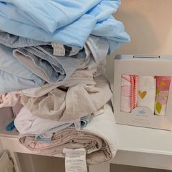 Crib Sheets, Underpads, and Muslin Blankets