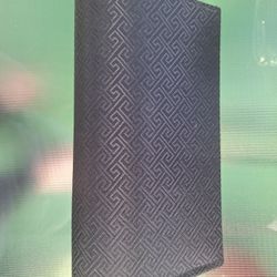 Elegant Black Clutch Bag with Geometric Pattern