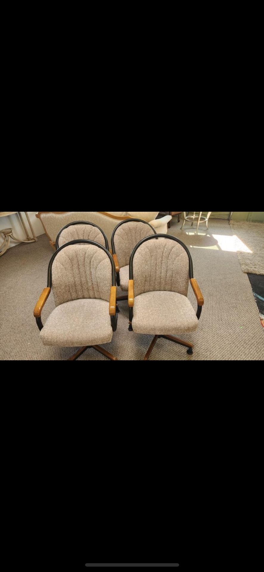 Four Swivel Chairs