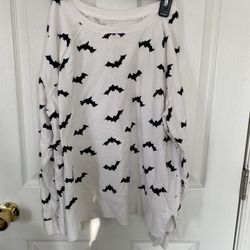 White Sweater with Bat Pattern