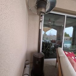 EAST OAK One-Hand Ignition Patio Heater with a full tank of gas.