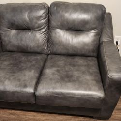 Leather Loveseat - $400
