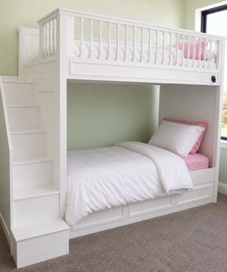 White bunk bed with built-in staircase