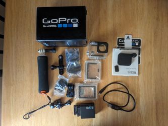 Hero 4 Silver GoPro. Barely Used. Lots Of Accessories Is
