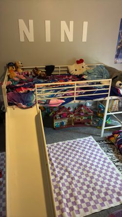 Twin size bed frame with slide