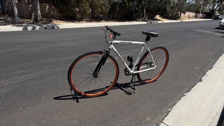 Thruster Sequence Fixie Bike with 28” wheels, new tires, and tubes.