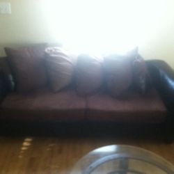 My love couch for sale also got microwaves and tables If Interested