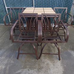 Used Hampton bay Bar High 5  piece  outdoor Tile Top table 4 chairs
