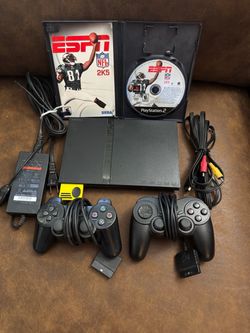 PlayStation 2 controllers corded, memory card and one game