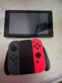 Nintendo Switch Console with Joy-Con Grip