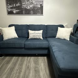 SUEDE SOFÁ BED WITH PILLOWS AND BLANKET