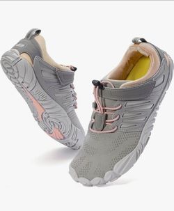 Whitin women's minimalist barefoot trail running shoes.