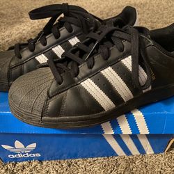 Black Adidas Superstars