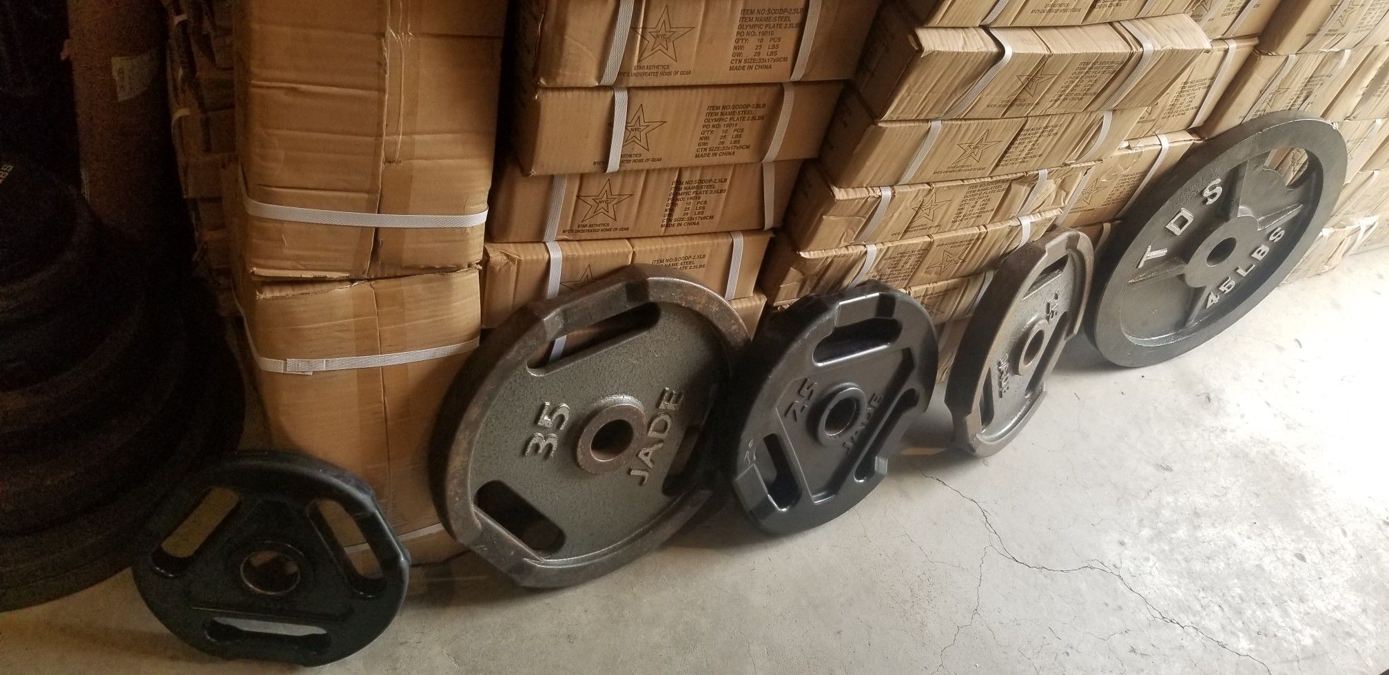 SINGLE OLYMPIC WEIGHTS PLATES NOT PAIRS .40 CENTS PER LB