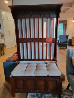Entry bench with cushion, storage, hooks and shelf