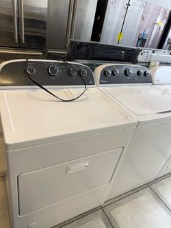 Whirlpool top load washer and gas dryer set