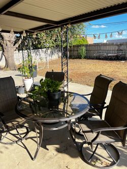 Patio dining table with four chairs