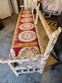 Ten foot long Hand Carved custom bench and Hand stitched Top Bench Cushion.