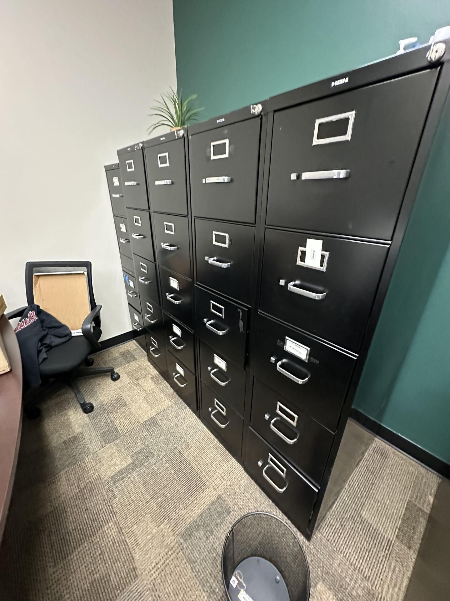 4 tall black filing cabinets