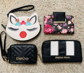 Lot of four designer wallets
