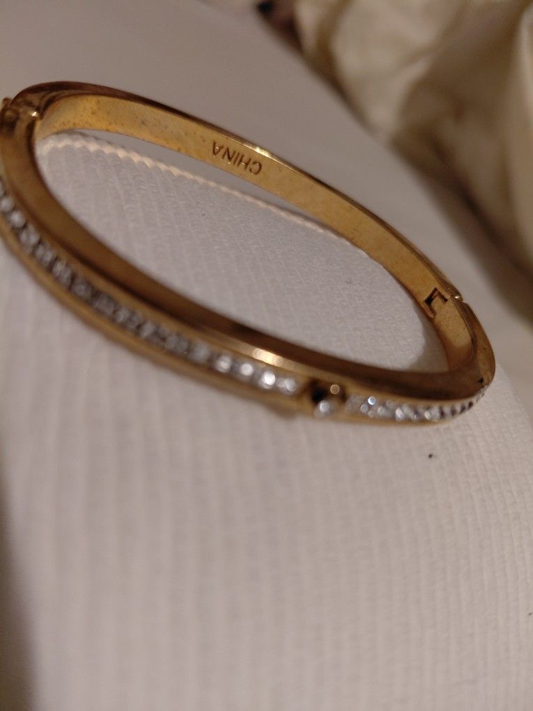Gold tone diamond bracelet