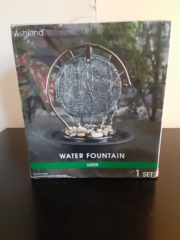 Brand New Ashland Tabletop Water Fountain Comes With Base, Top, Pump, and Bag of Rocks.


