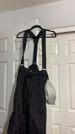 Black Snow Bib Ski Pants with Suspenders and goggles