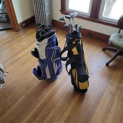 Two Golf Bags And Clubs!