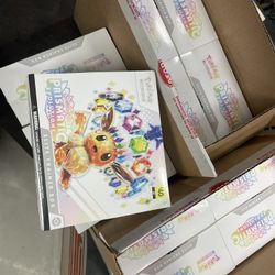 12 Pokemon Prismatic Evolutions  ETBs