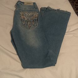 Light Blue Mid Rise Flair Jeans Bling Design On Back Pockets