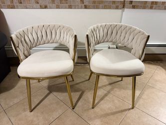 Beautiful set of 2 modern velvet dining chairs in beige/cream with elegant gold metal legs.