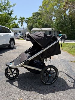 THULE double jogging stroller - Like New