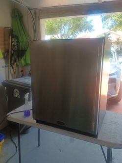 Refrigerator, under counter, 32 in tall.
