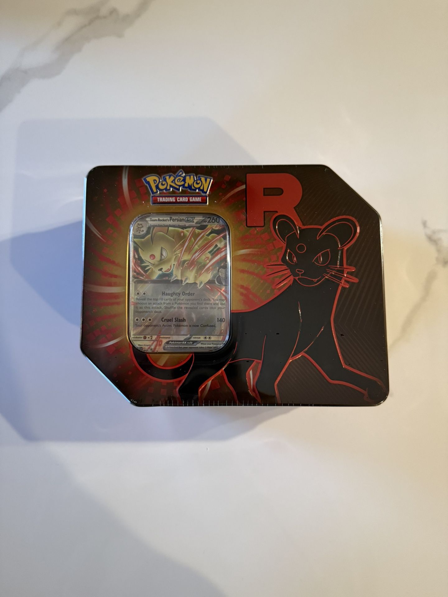 team rocket tin