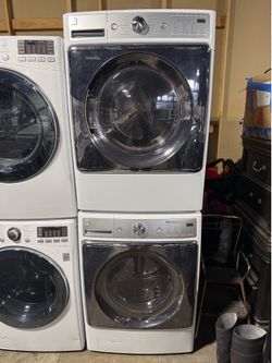 Kenmore jumbo white front load washer and gas dryer set