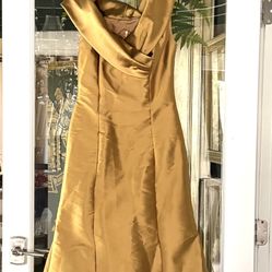 long special occasion dress by brazilllia is draped in mustard-colored satin, size 4