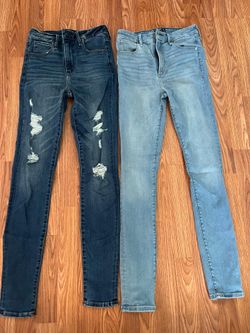 2 pair of Abercrombie & Fitch jeans feature one  dark wash and one light and a super skinny fit.  Size 26