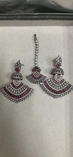 Earrings and Tika 