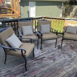 4 Outdoor Chairs With Cushions/ Pillows And Cushion Storage Chest. 