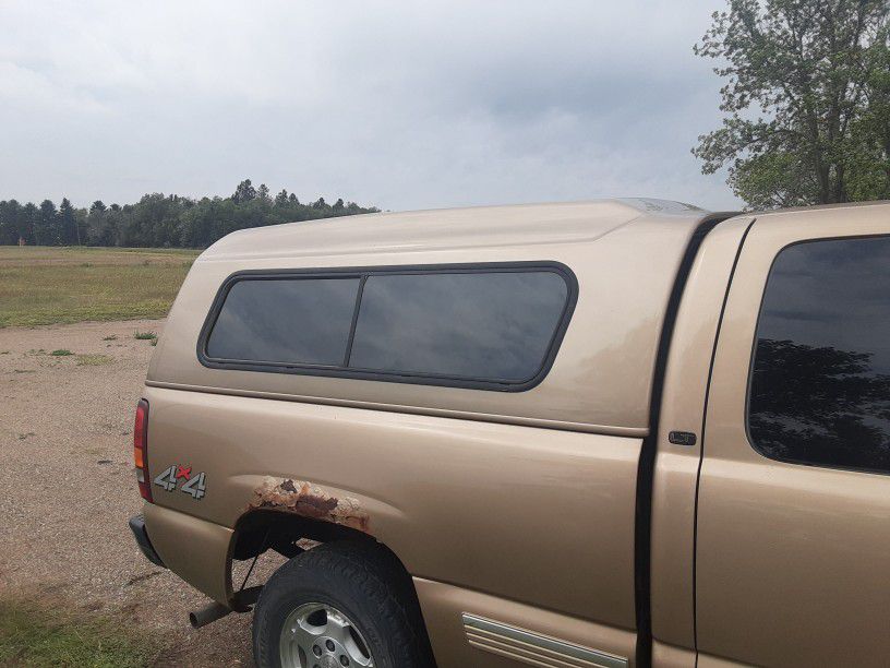 Camper Shell On A '99 Chevy Silverado In Excellent Condition. 
