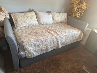 Gray upholstered daybed