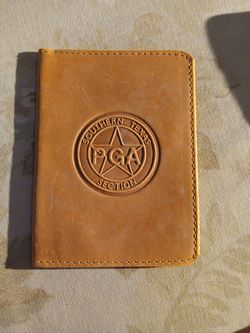 Southern Texas Section PGA Leather yardage book cover or score card holder.