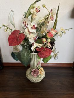 Vase With Flowers In Good Condition.